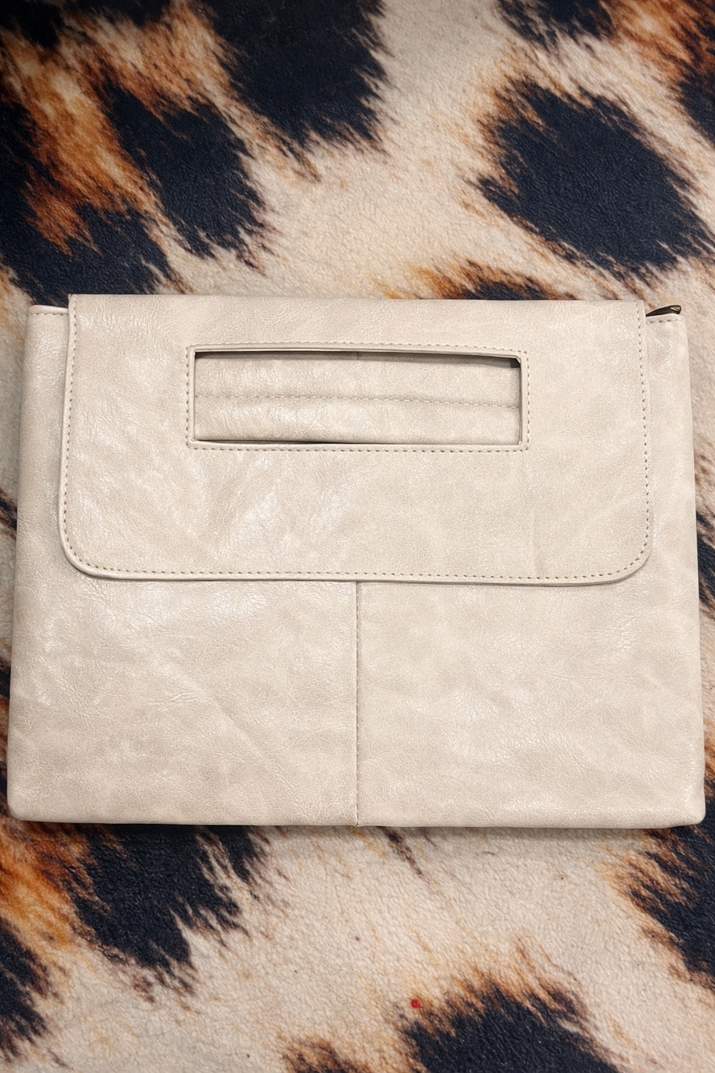 Form Arm Clutch Bag