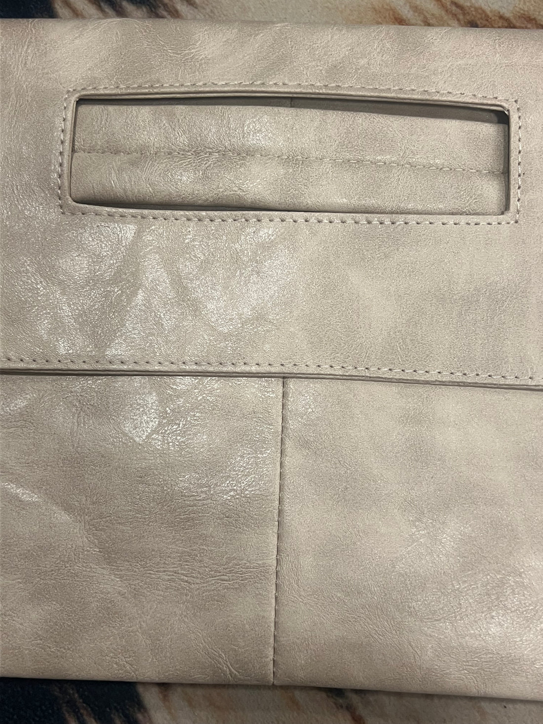 Form Arm Clutch Bag